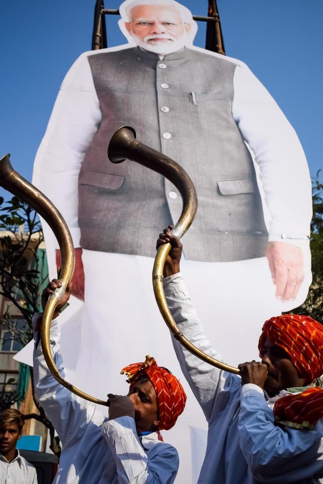 New Delhi, India - January 16 2023 - Prime Minister Narendra Modi cut out during BJP road show, the status of PM Modi while attending a big rally in the capital photo