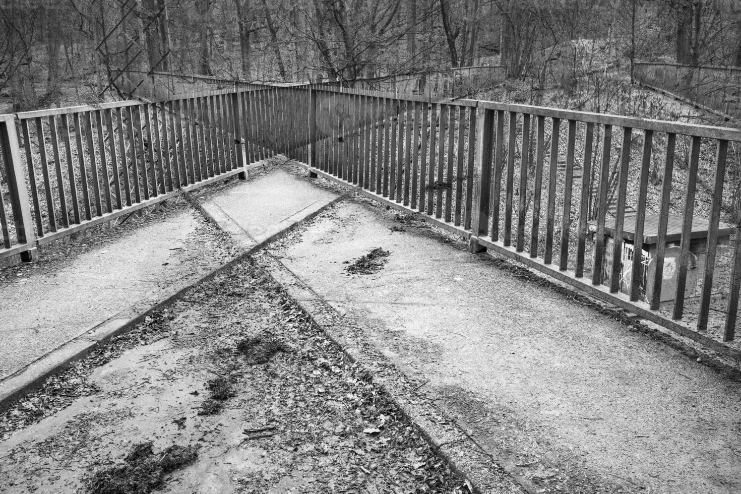 double exposure, crossing railings in black white photo