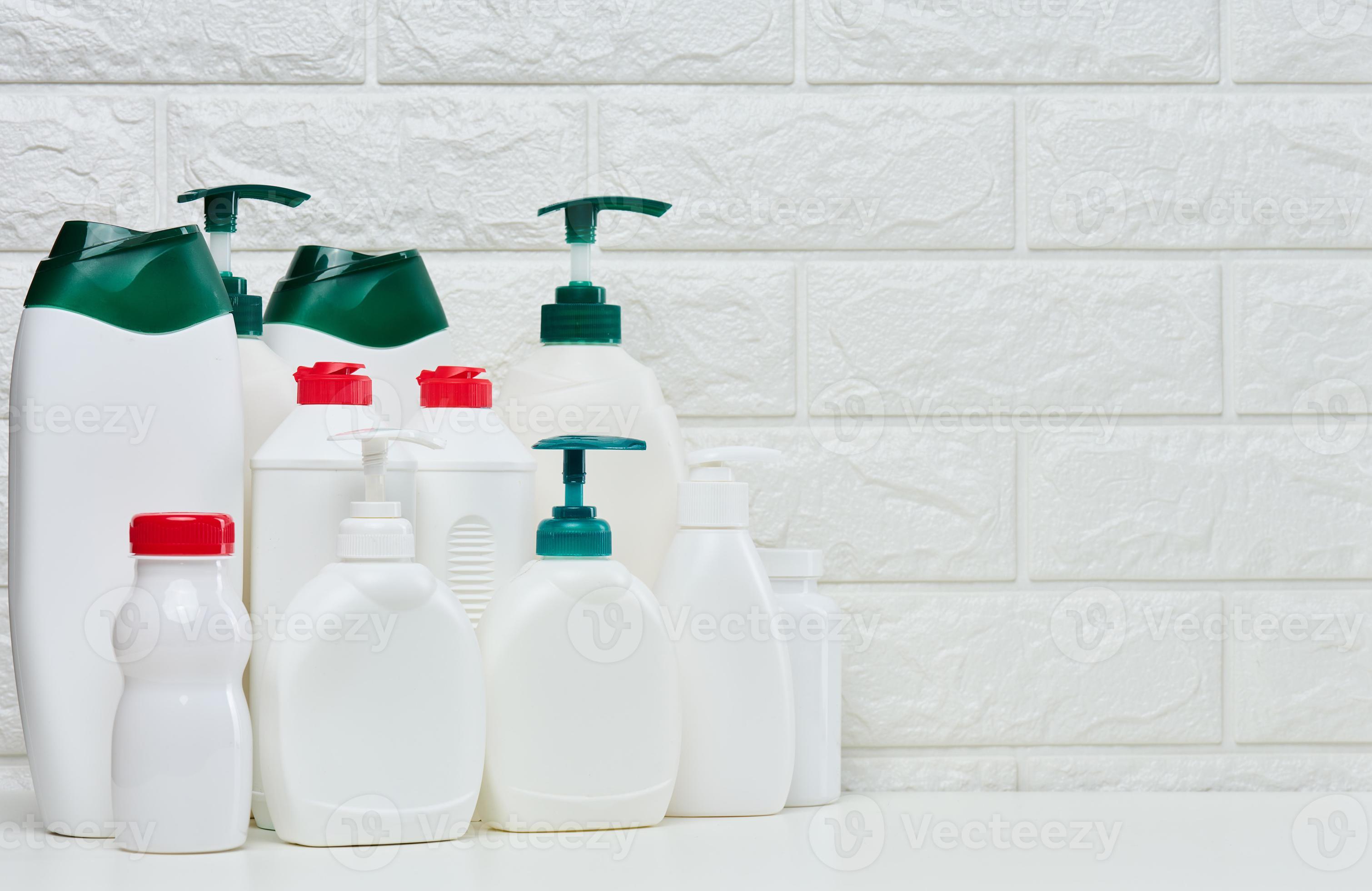 Empty plastic white bottles for cosmetics and other liquid substances