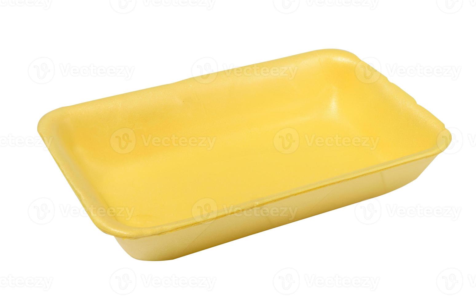Empty yellow plastic container for products on a white background photo