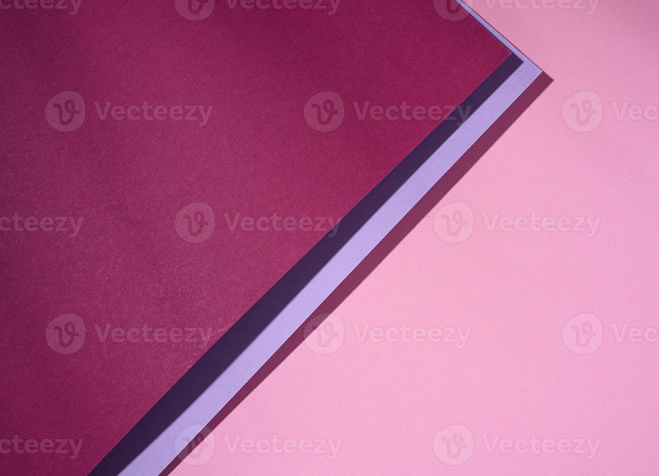 Modern pink background with sheets of paper with shadow. Template for business photo