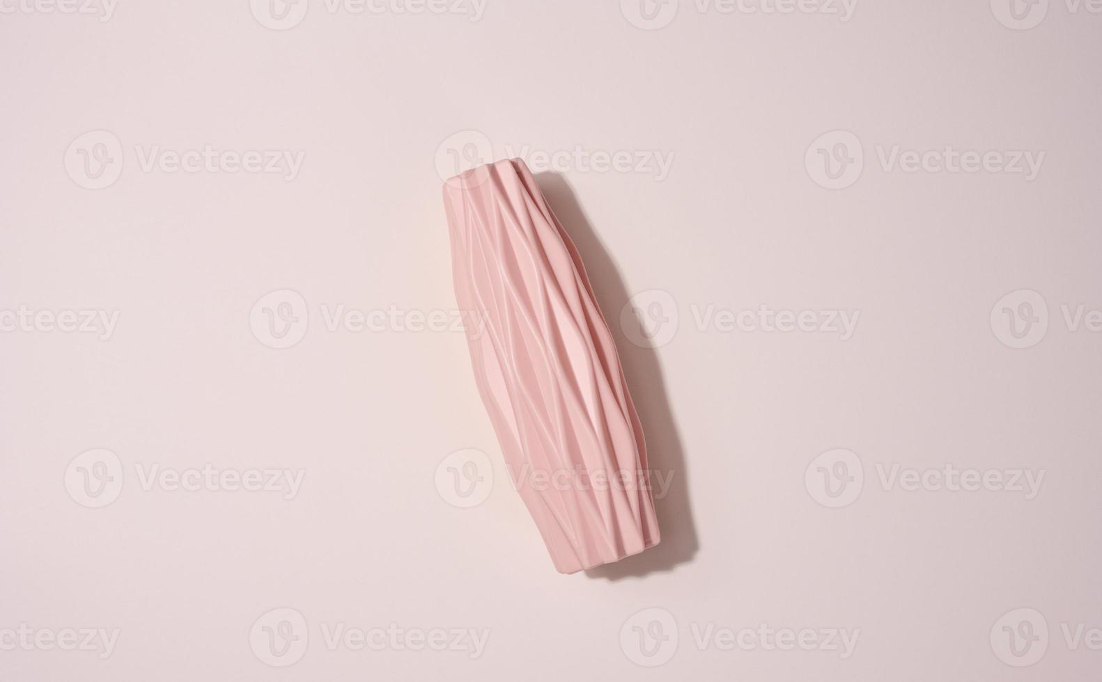 Ceramic vase on a beige background photo