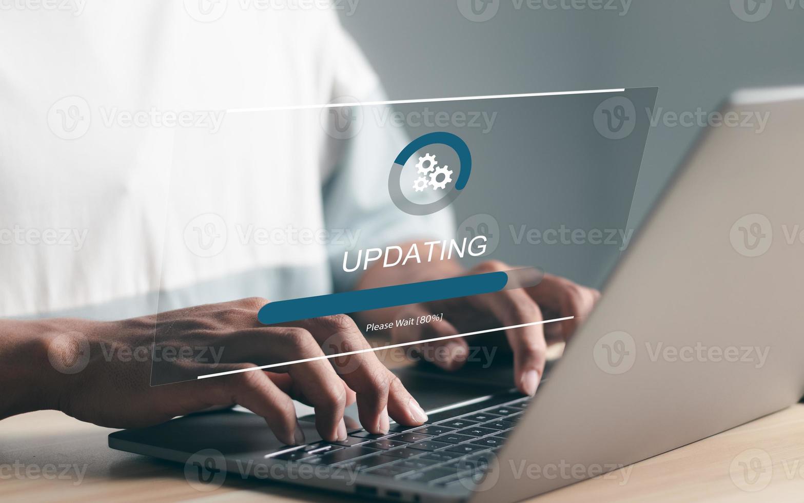 Businessman working and Installing update process. Software update or operating system upgrade to keep the device up to date with added functionality in new version and improve security. photo