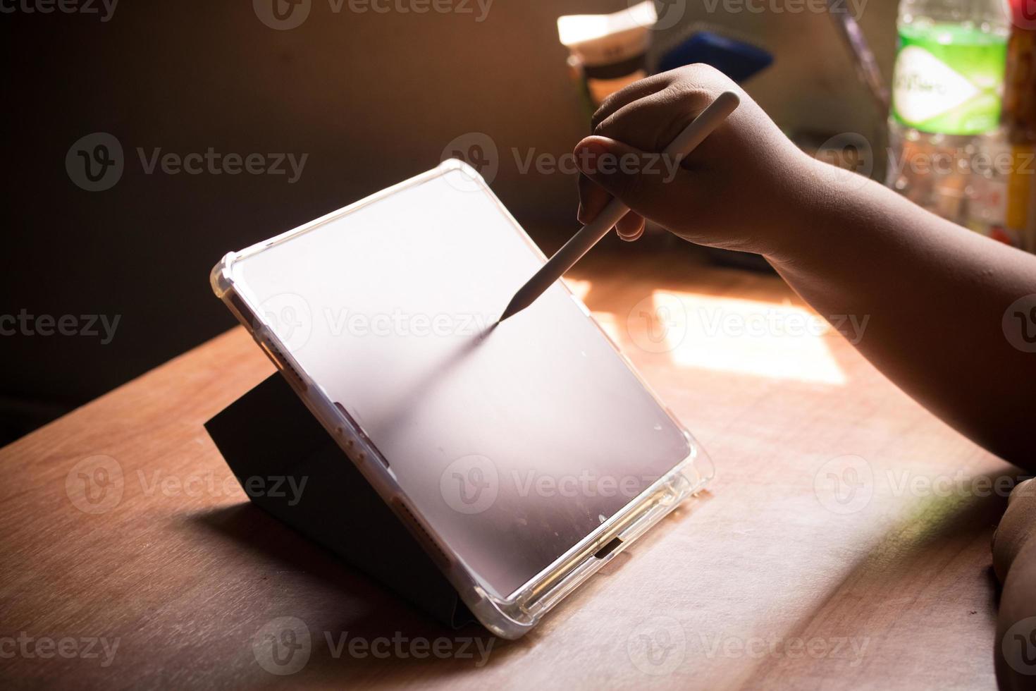 using tablet and technology in the morning photo