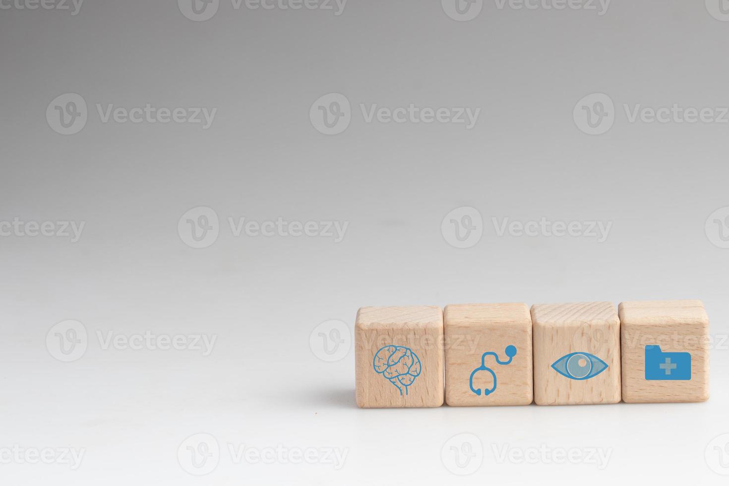 Wooden blocks and medical signs.Health care concept. photo