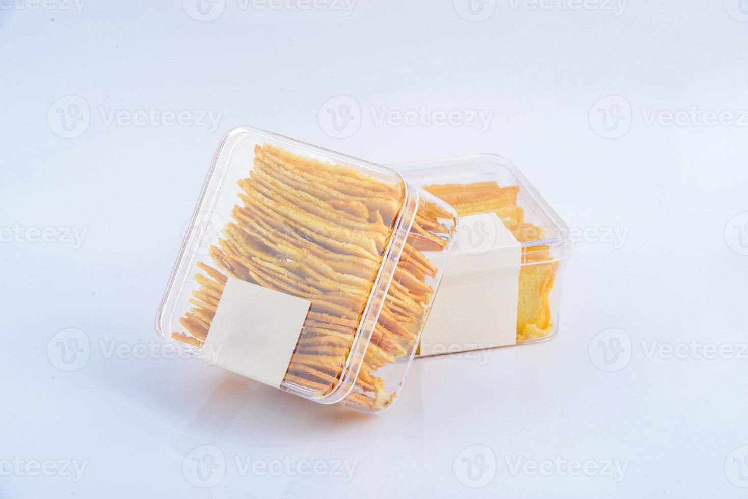 The snack cracker butter in the transparent box. photo