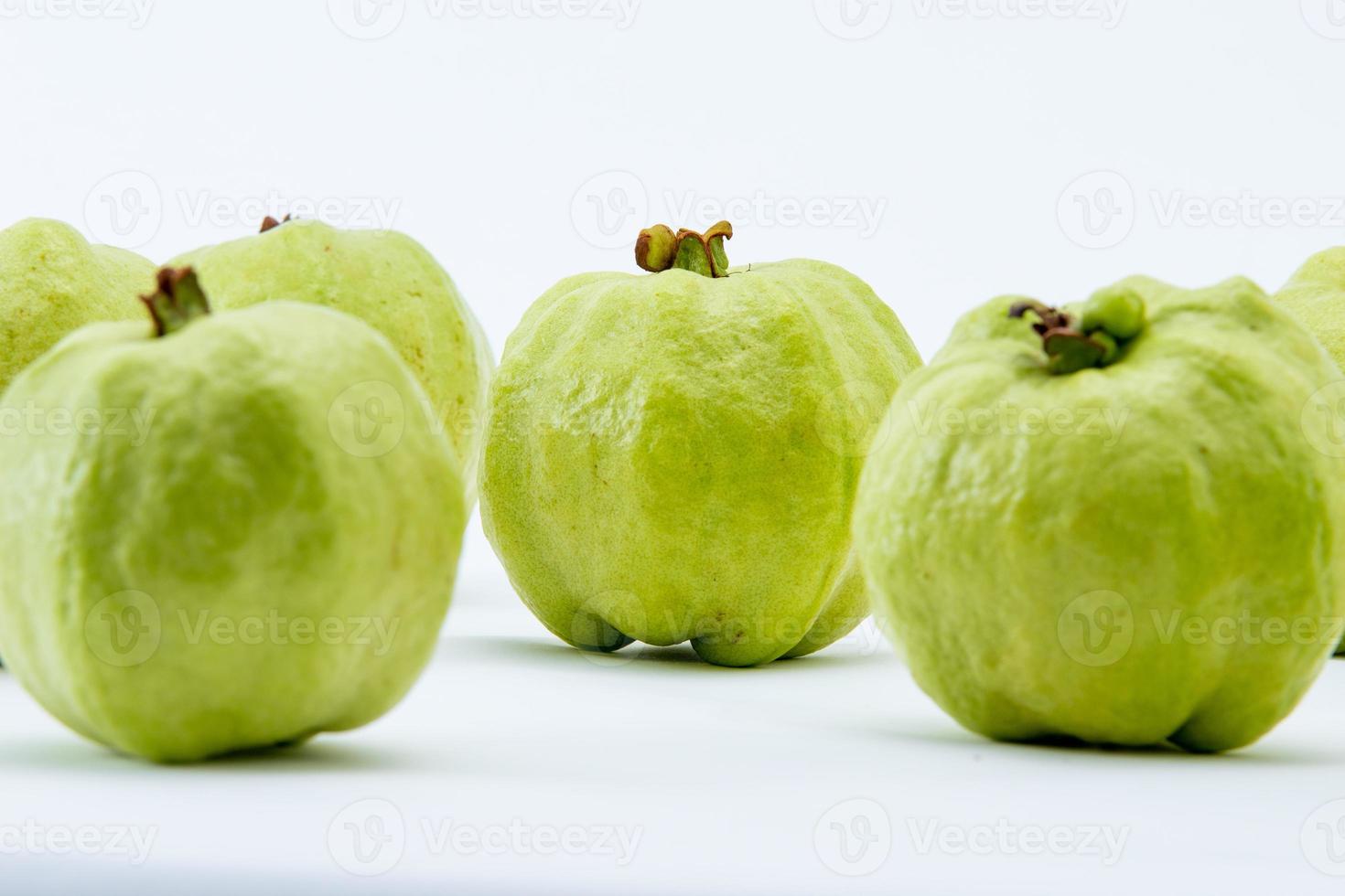 Favorite fruit in Thailand. Guava on the white background. photo