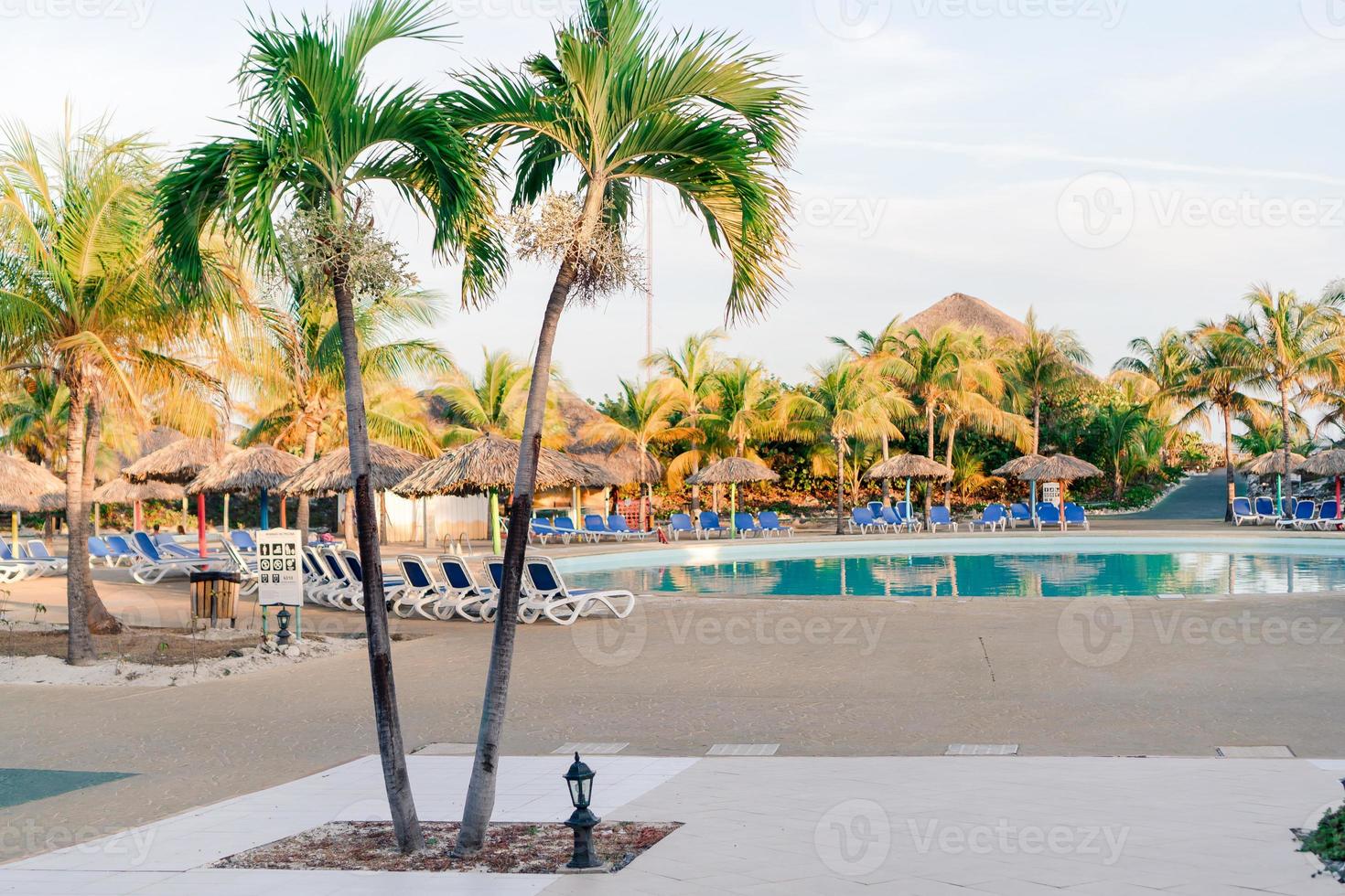 Beautiful luxury landscape around pool in hotel resort photo