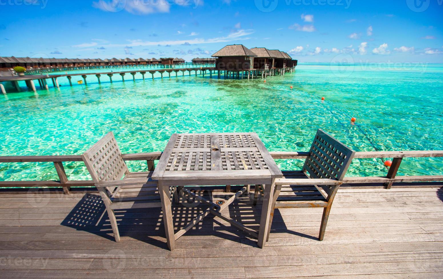 Summer empty outdoor cafe at exotic island in indian ocean photo