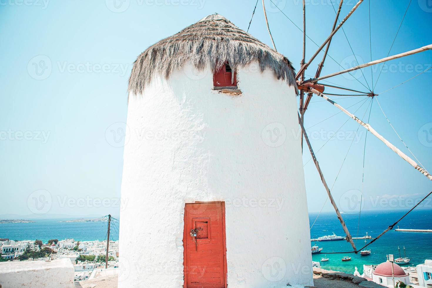 Old traditional windmills over the town of Mykonos. photo