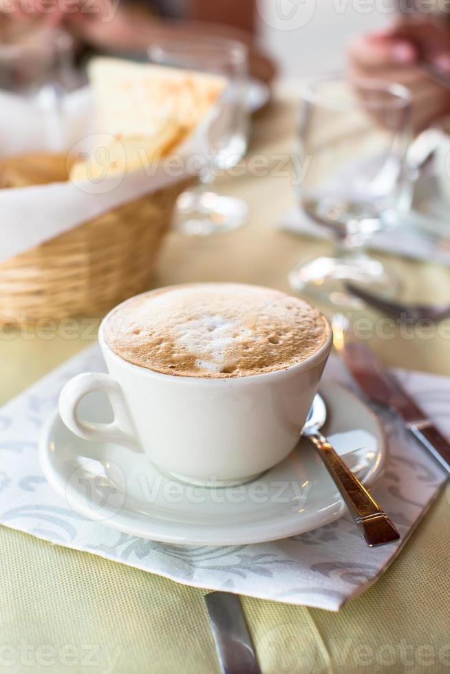 Delicious, aromatic cappuccino for breakfast at a cafe in the resort photo