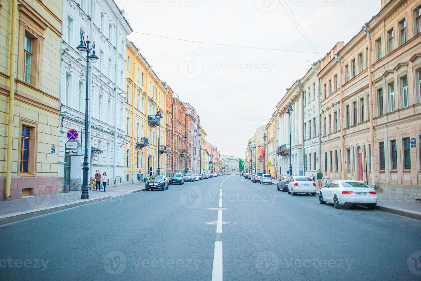 Ancient streets and embankment with the Neva River in the city of Saint Petersburg photo