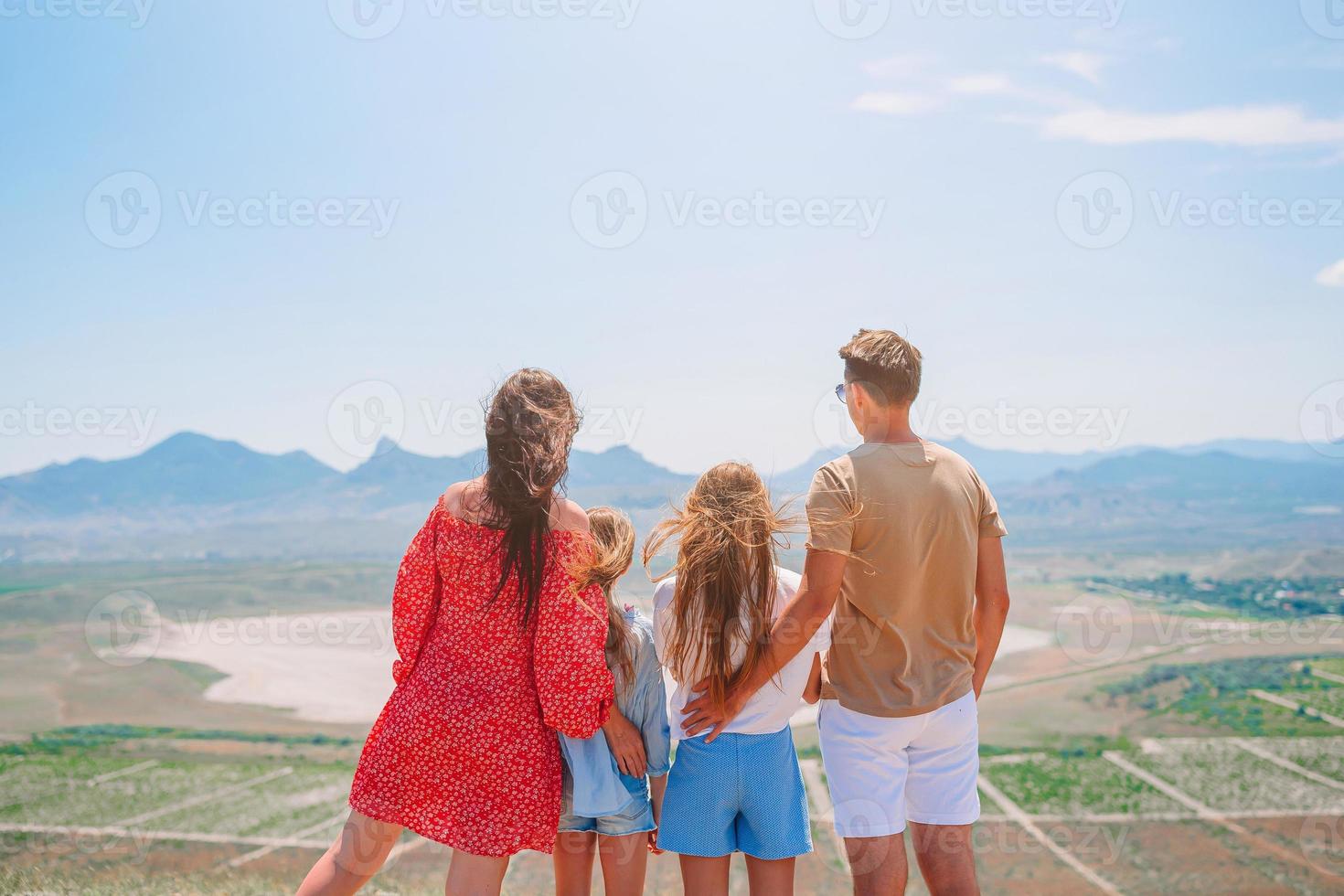 Happy family on vacation in the mountains photo