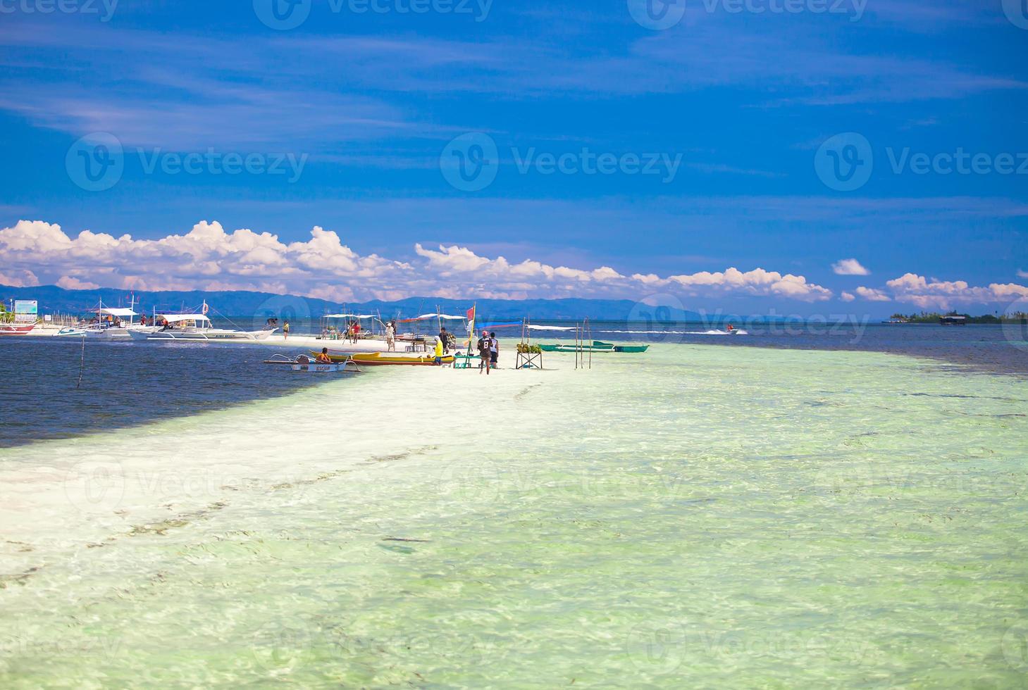 Beautiful tropical beach on desert island photo