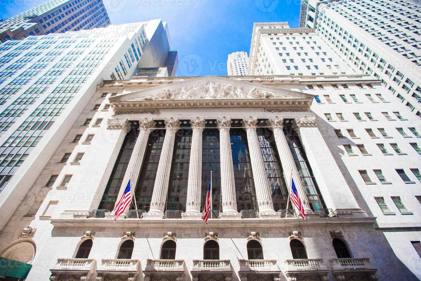 New York Stock Exchange in Manhattan Finance district. View of the building in the sky photo