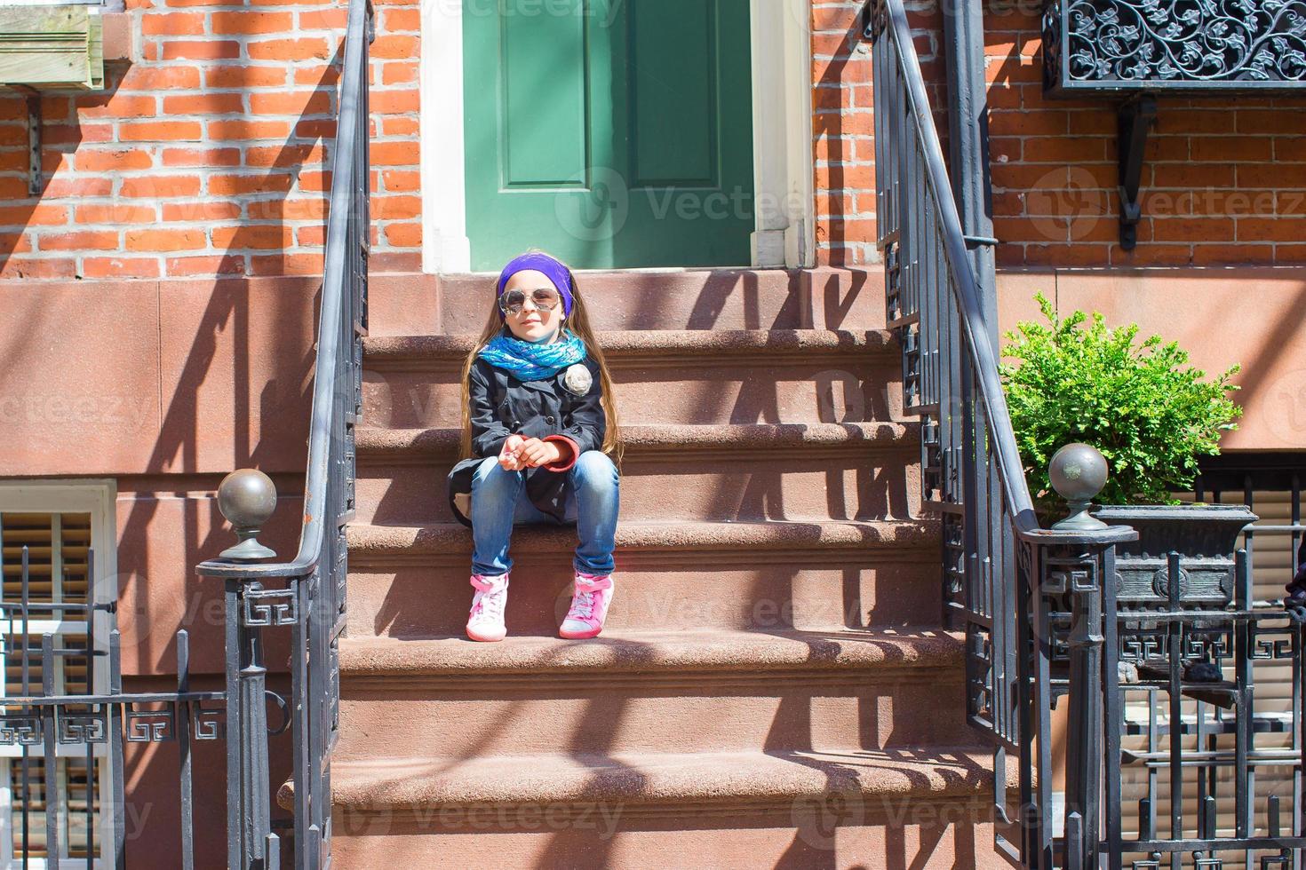 Little girl in historic district of West Village photo