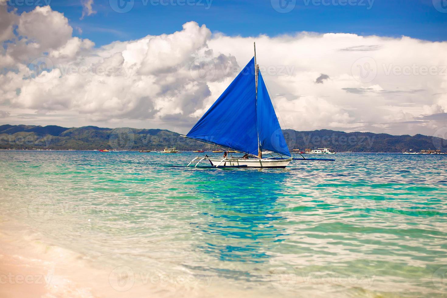 Blue Boats on Boracay island in the sea, Philippines photo