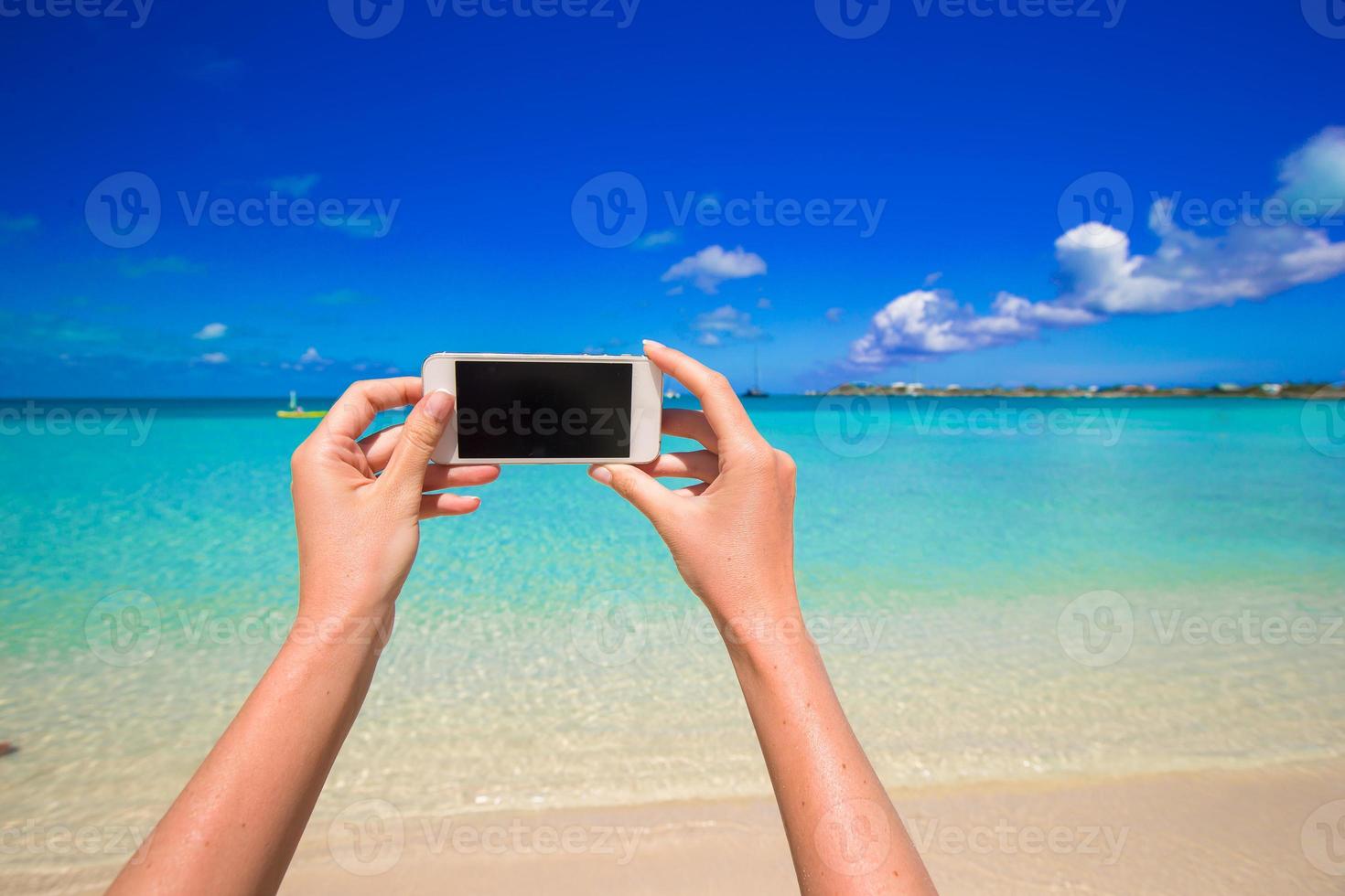 Closeup telephone background turquoise sea photo
