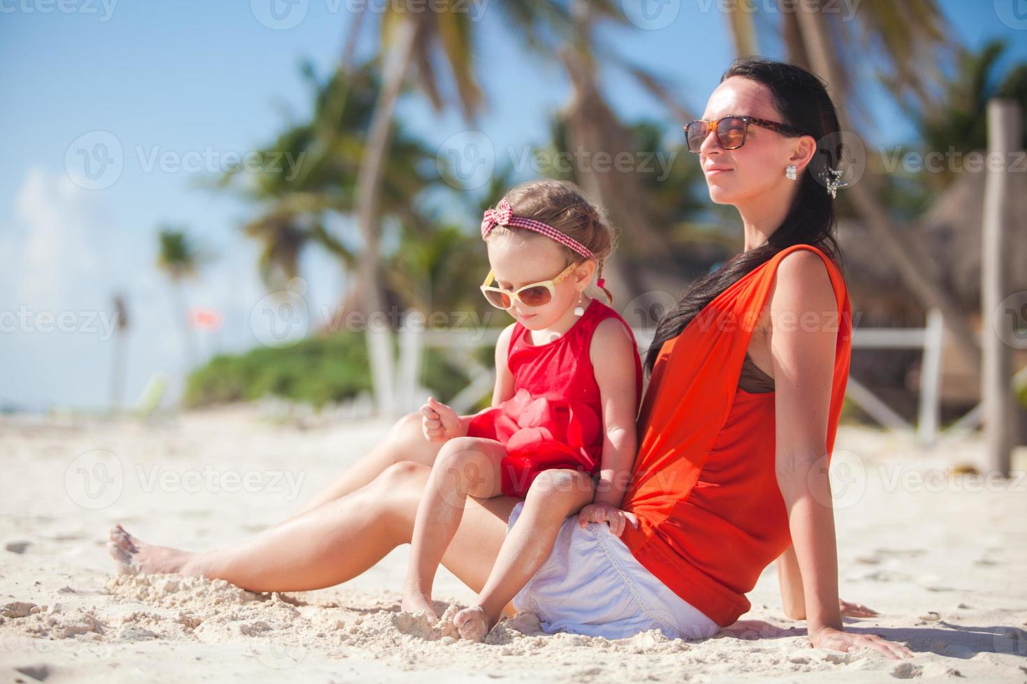 Family vacation on carribean beach photo