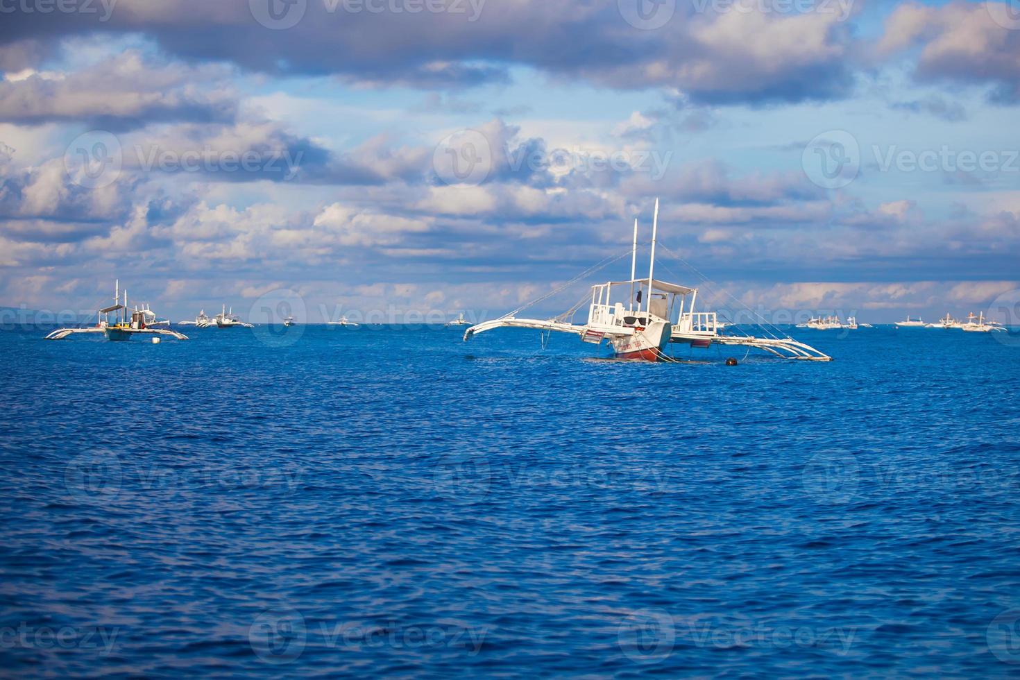 Big catamaran in the open sea near Bohol island photo