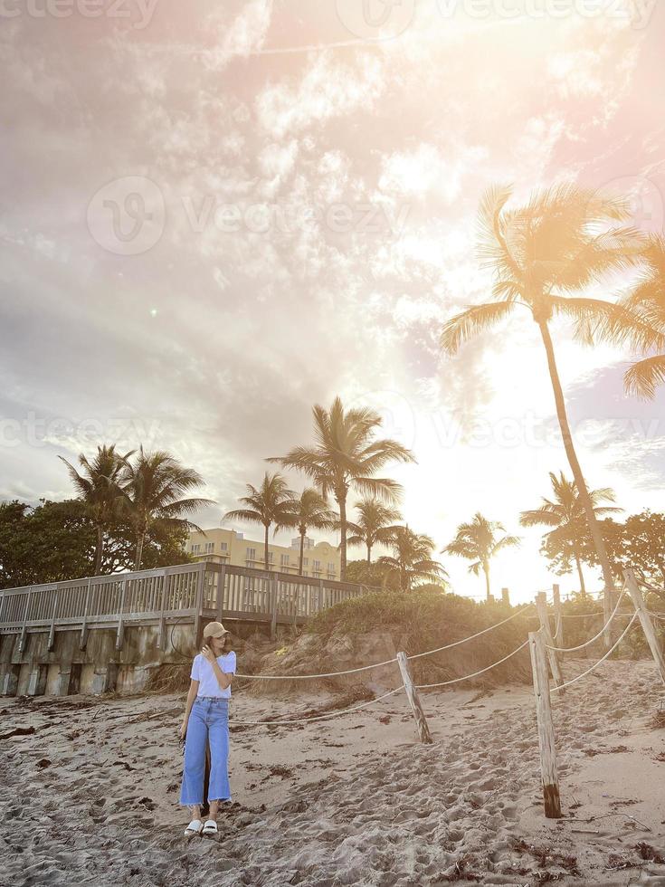 Young beautiful woman relax on the beach photo