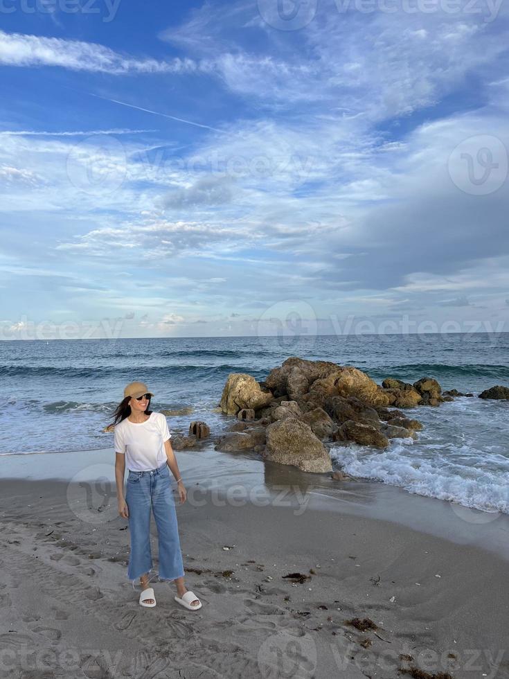 Young beautiful woman relax on the beach photo