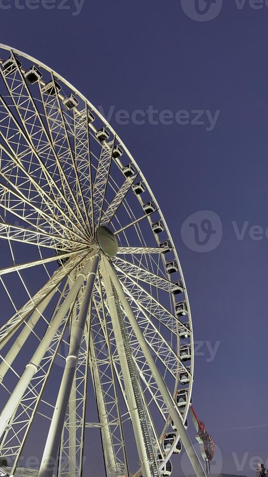 Ferris wheel in the park at the Downtown Miami at sunset photo