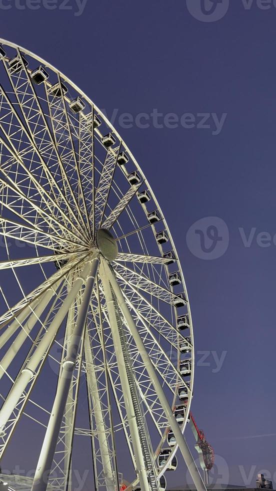 Ferris wheel in the park at the Downtown Miami at sunset photo