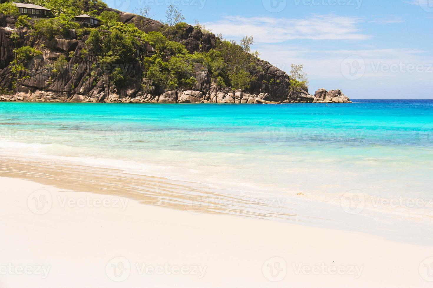 Landscape of beautiful exotic tropical beach at Seychelles photo