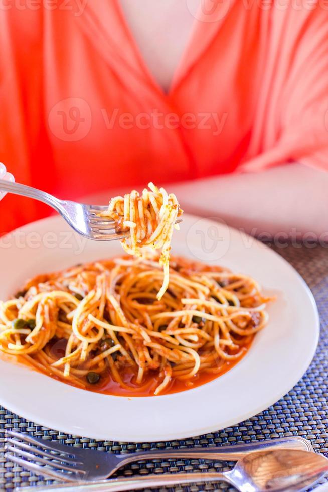 Spaghetti a la Bolognese in the white plate. photo