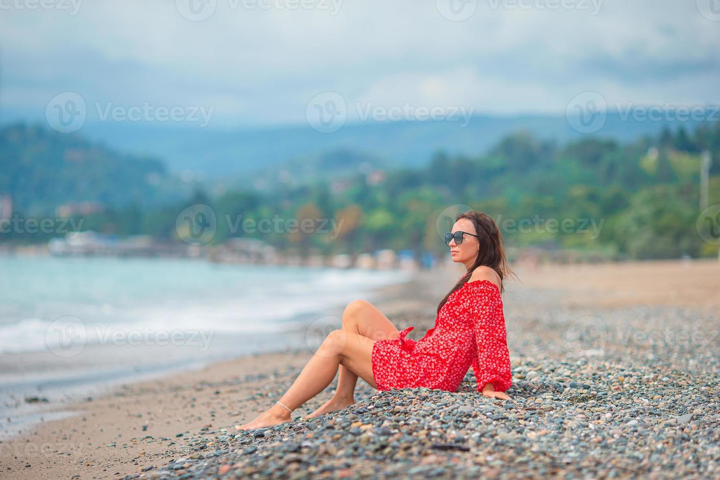 Young beautiful woman relax on the beach photo