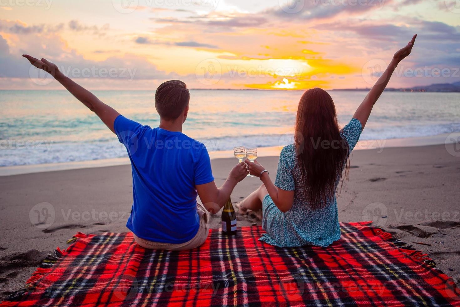 Family having a picnic on the beach 17768277 Stock Photo at Vecteezy