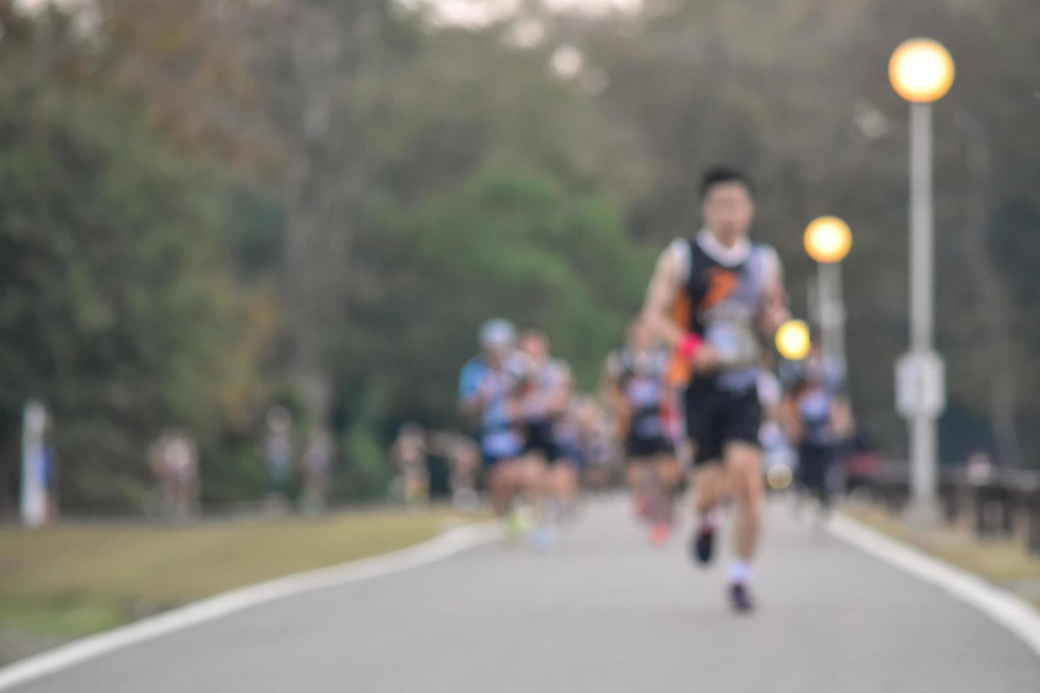 Blurred Group of people running. photo