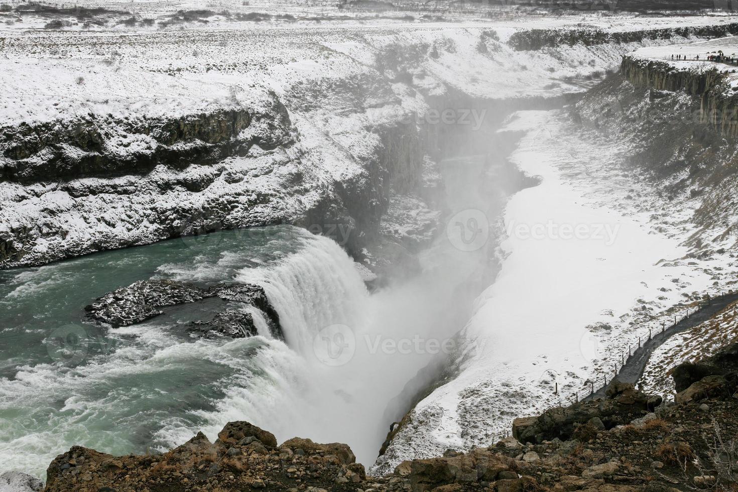 The Golden Circle Route of Iceland. In the winter season. There is a very large waterfall on the site photo