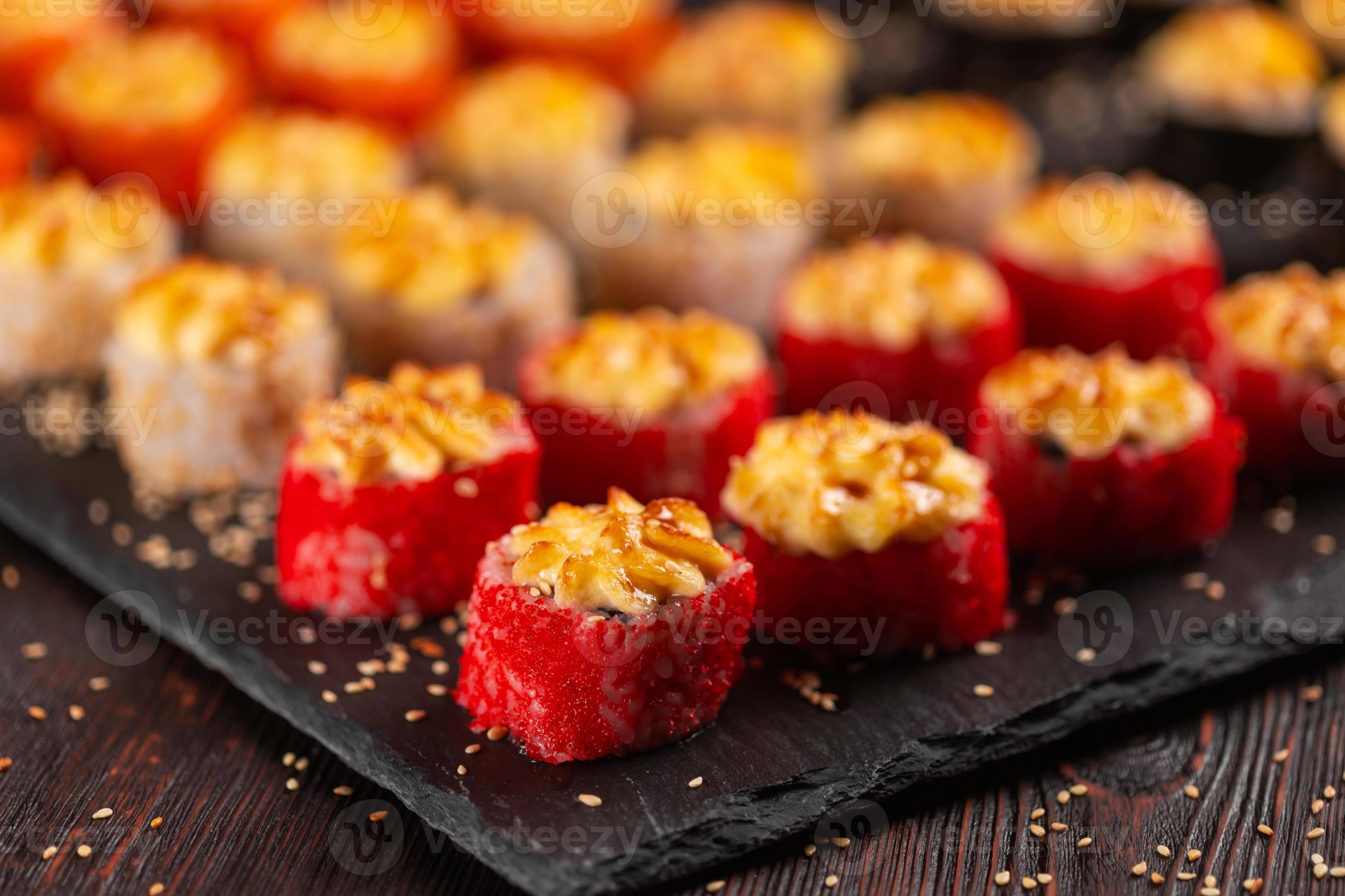 Japanese salmon sushi with spicy mayonnaise and tobiko caviar Sushi
