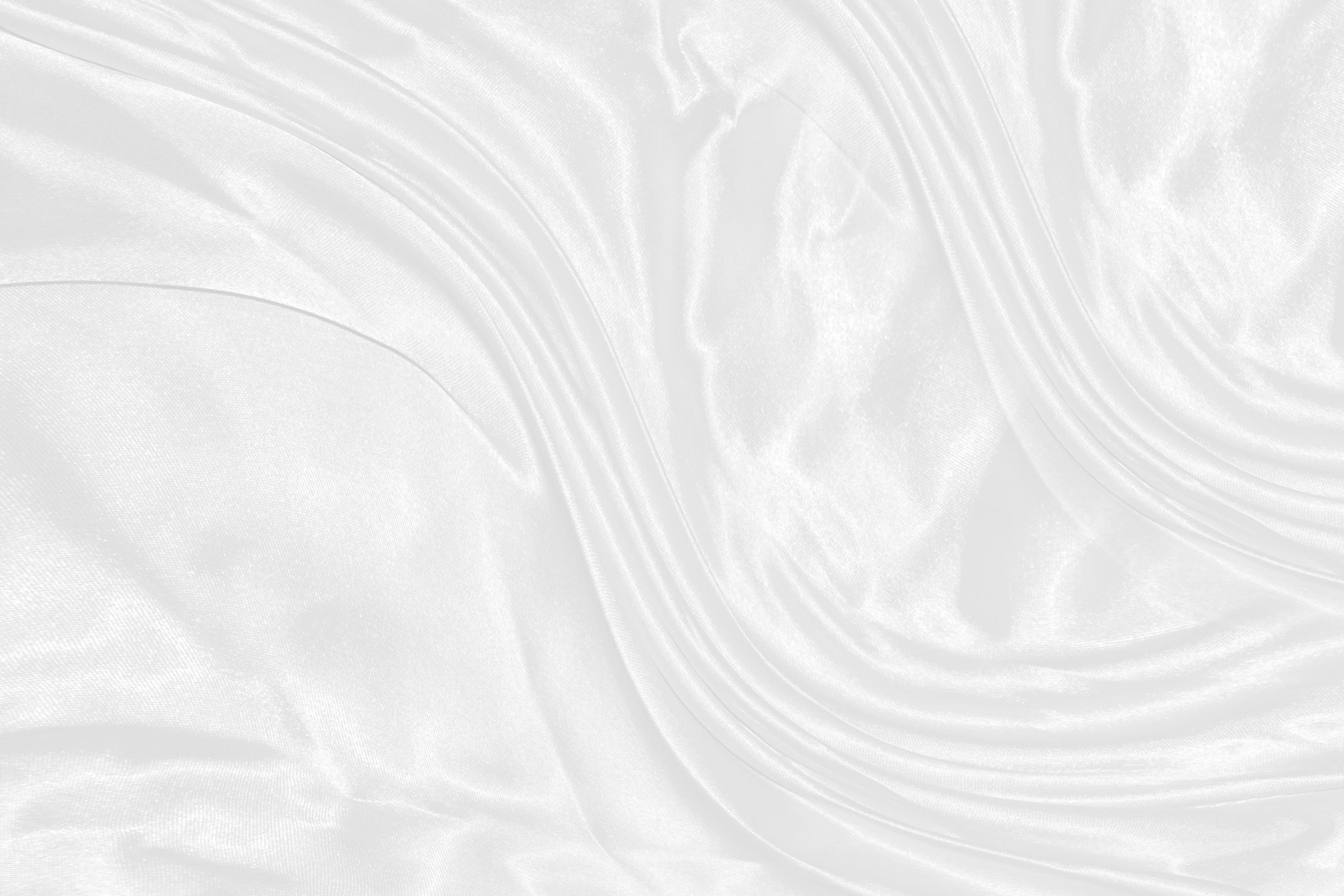suave y elegante fondo de textura de tela satinada blanca ondulada con  espacio para texto. 8927561 Foto de stock en Vecteezy