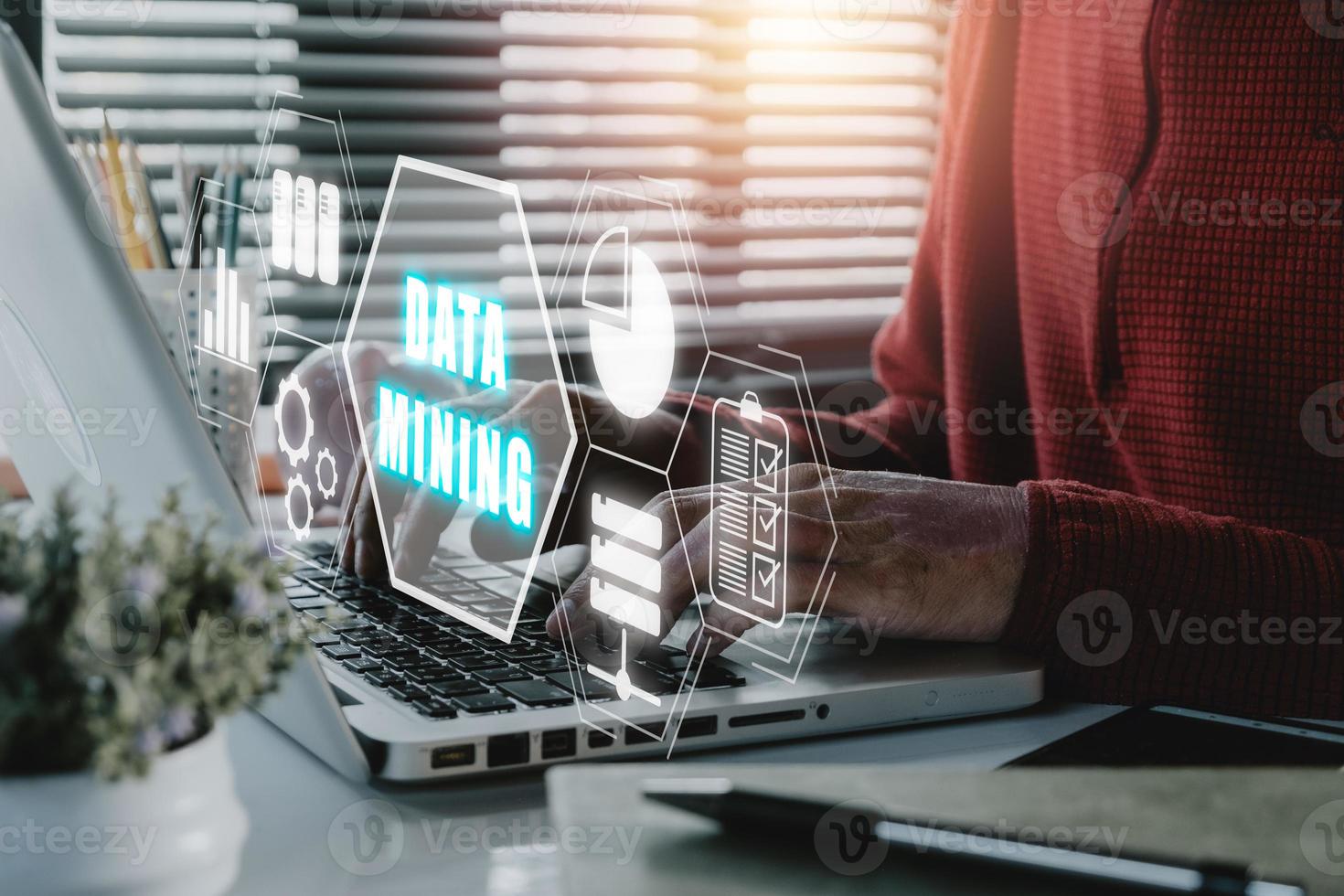 Data mining banner web icon for business and organization, Businessman working on laptop computer with data mining icon on VR screen, internet and networking concept. photo