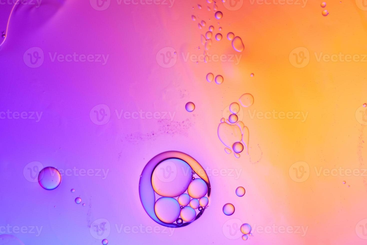 Top view movement of oil bubbles in the liquid photo