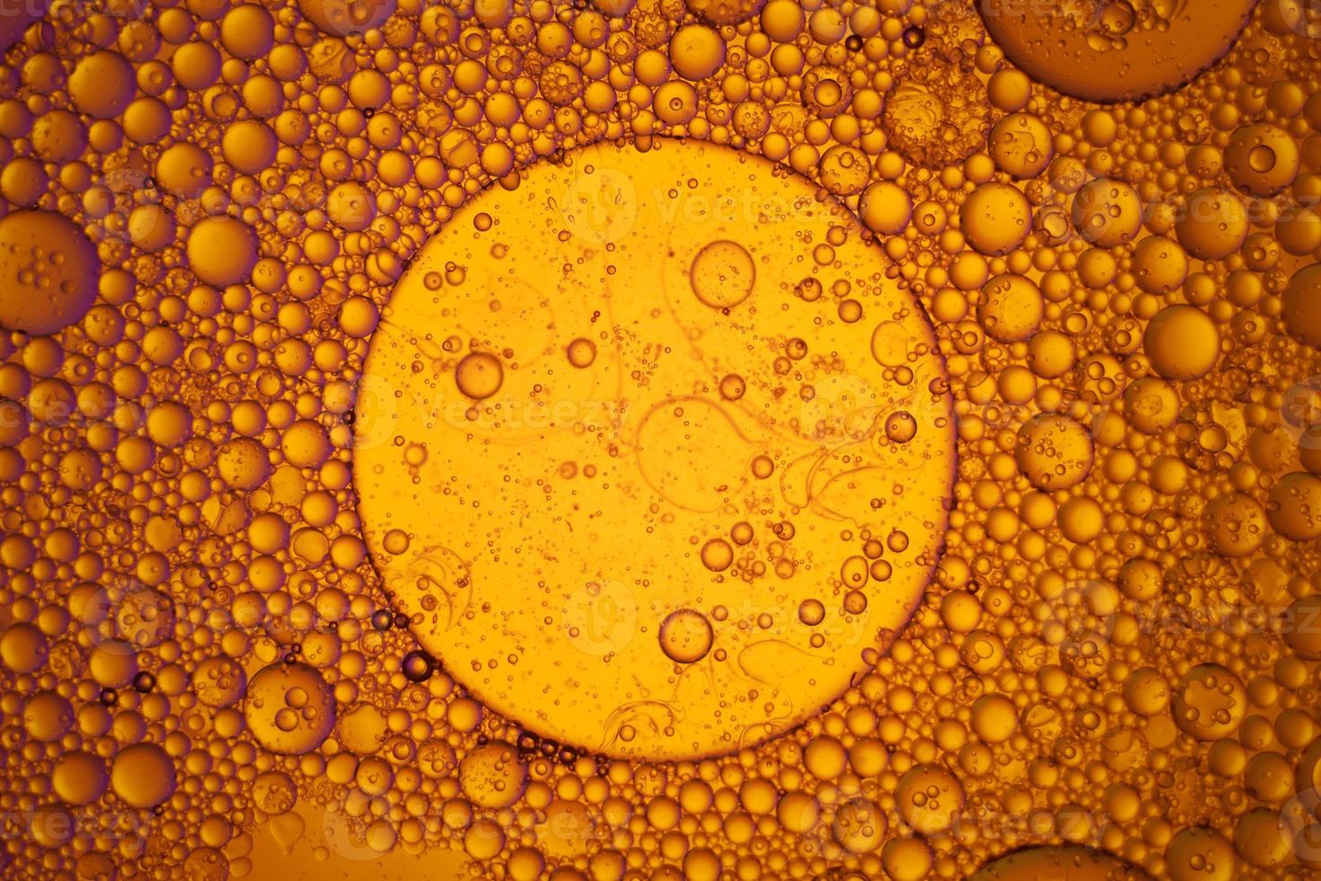 Top view movement of oil bubbles in the liquid photo