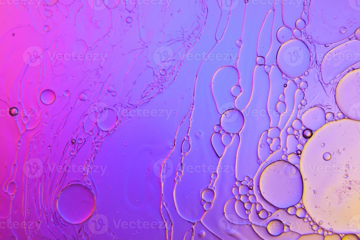 Top view movement of oil bubbles in the liquid photo