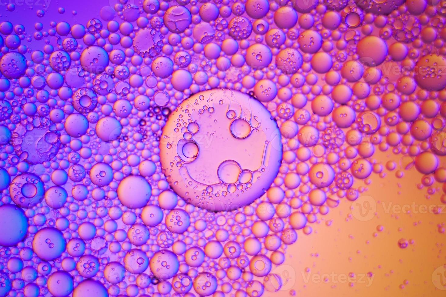 Top view movement of oil bubbles in the liquid photo