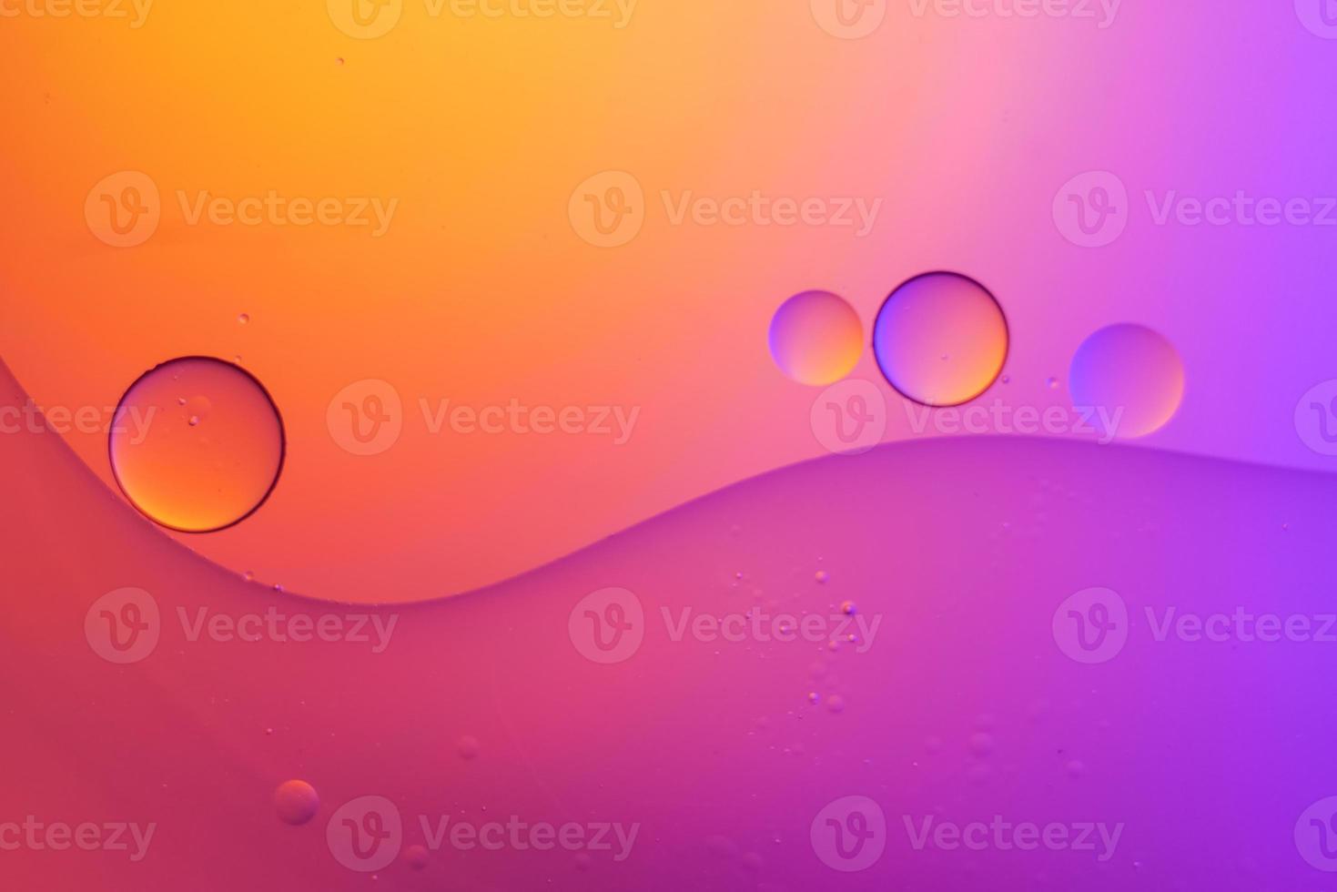 Top view movement of oil bubbles in the liquid photo