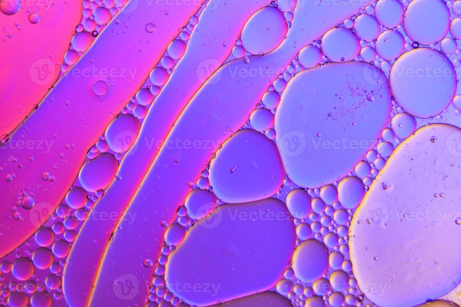 Top view movement of oil bubbles in the liquid photo