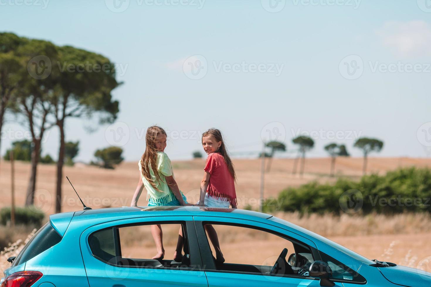 Summer car trip and young family on vacation photo
