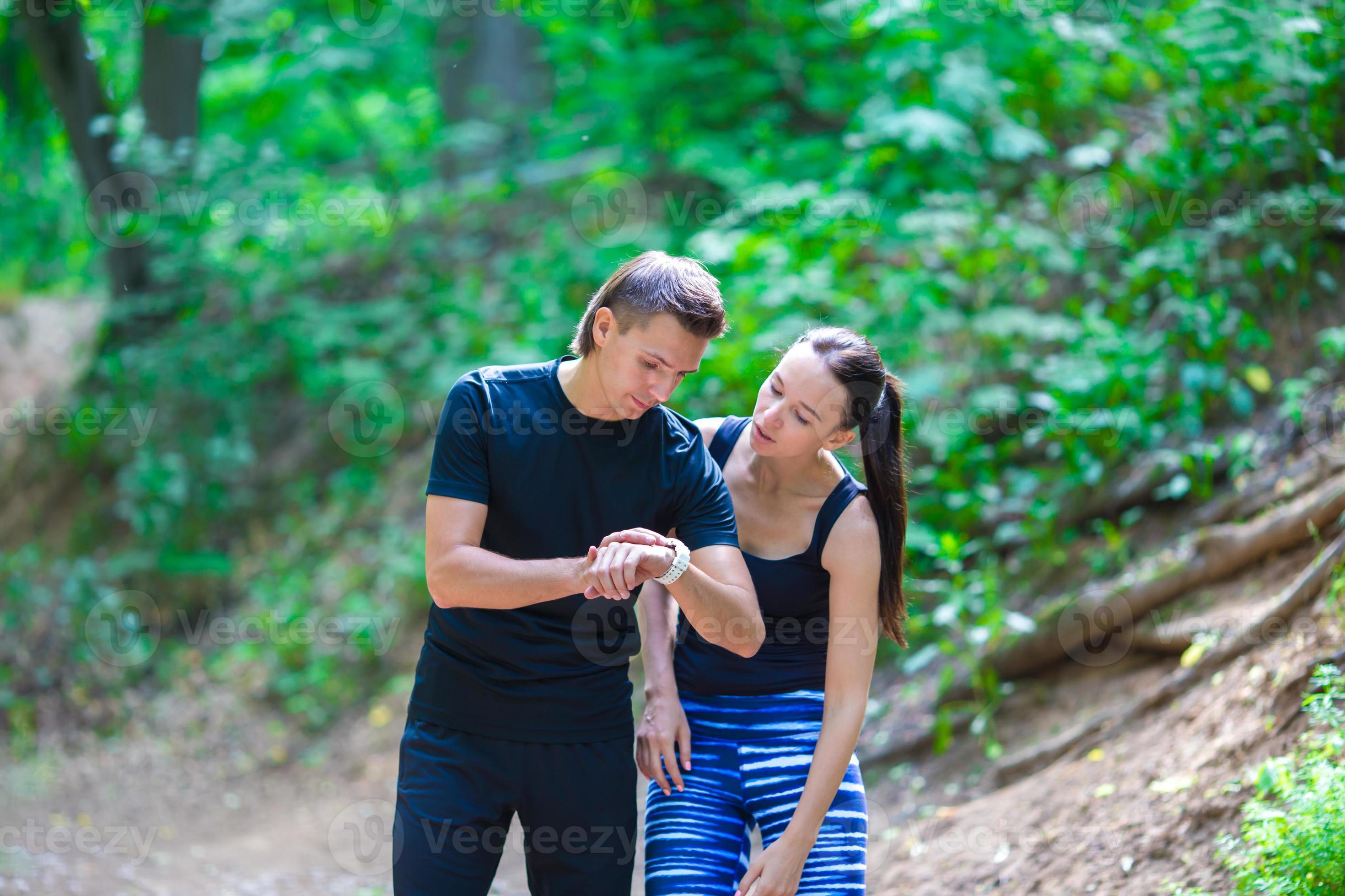 Couple watches photography shop