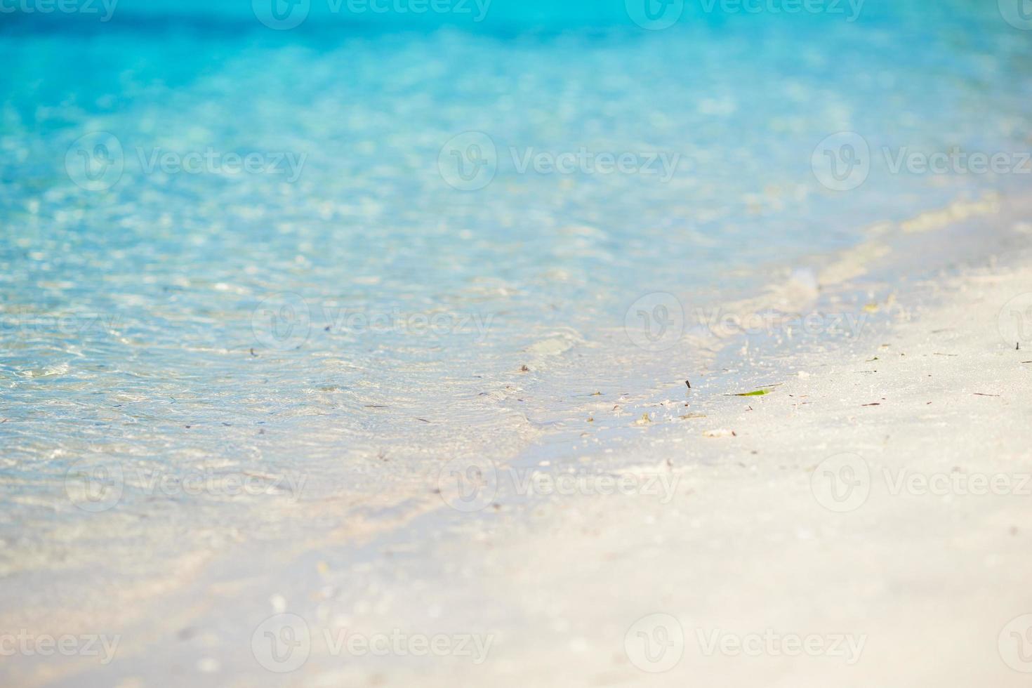 Idyllic perfect turquoise water at exotic island photo
