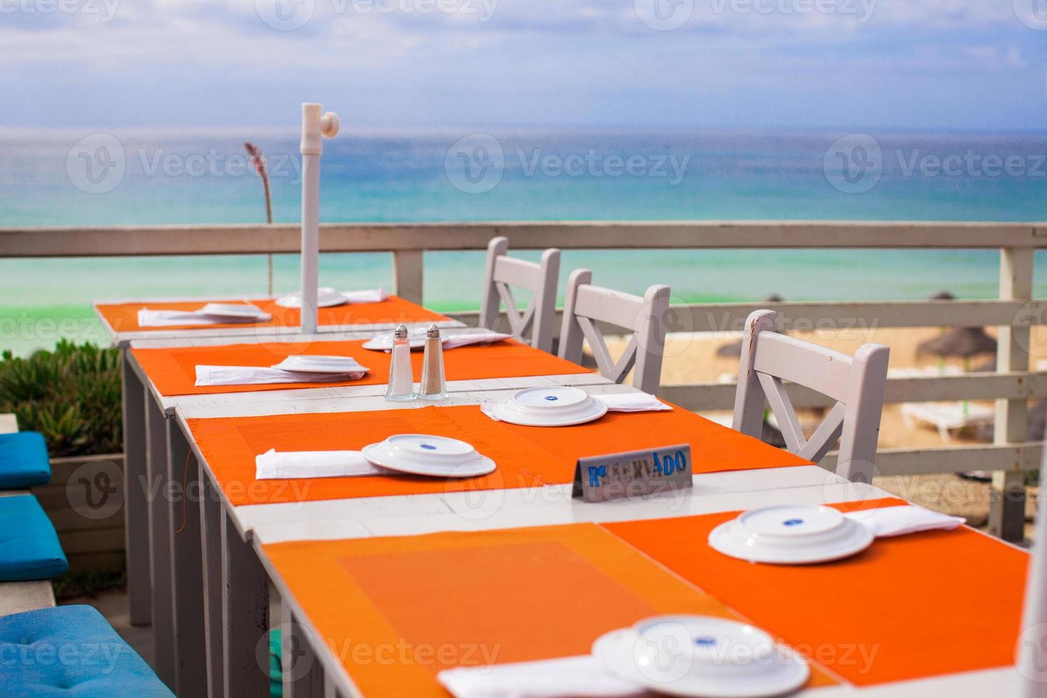 Outdoor cafe on the beach in Atlantic coast photo