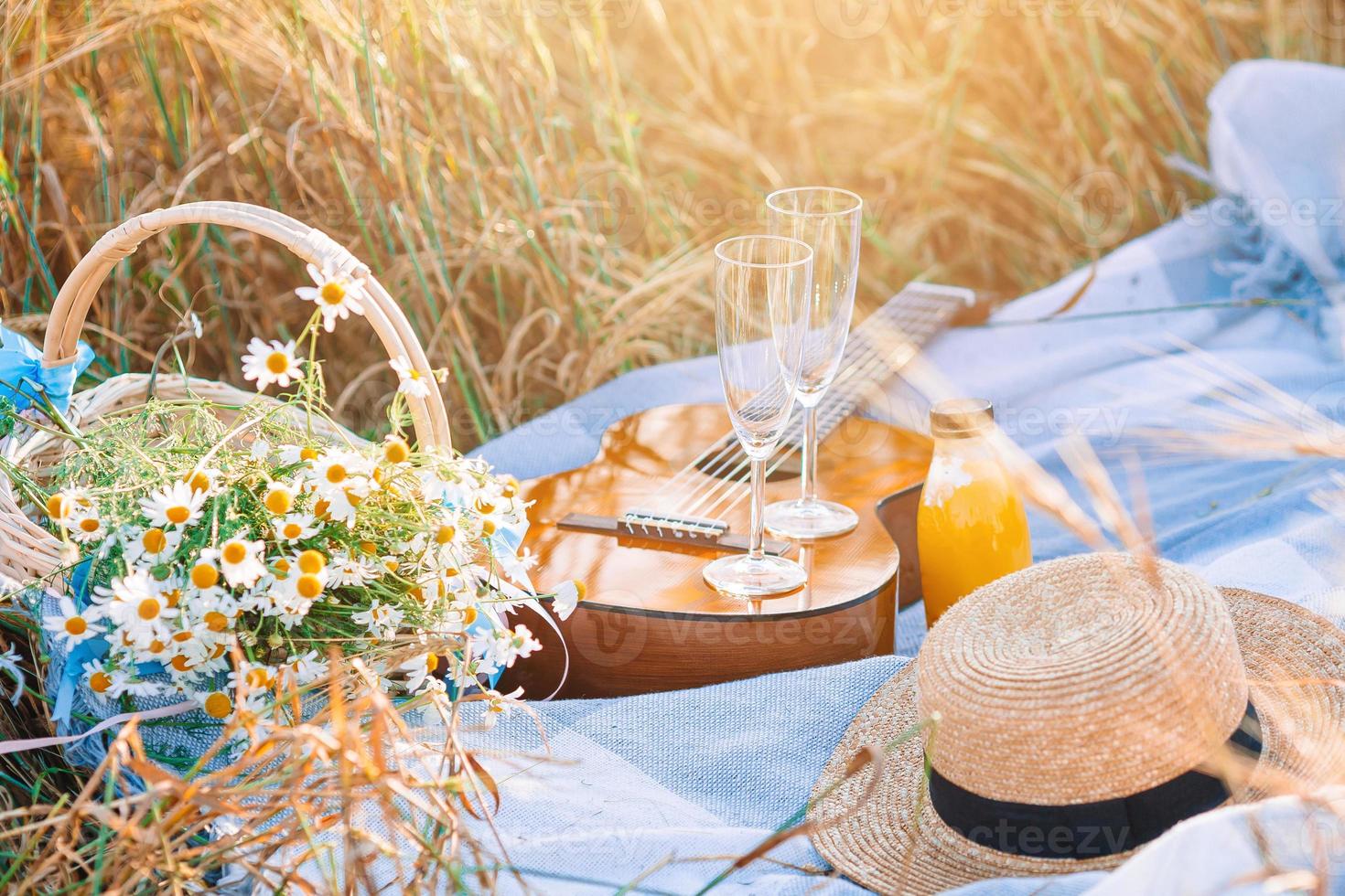 Closeup of picnic on nature in wheat field. photo