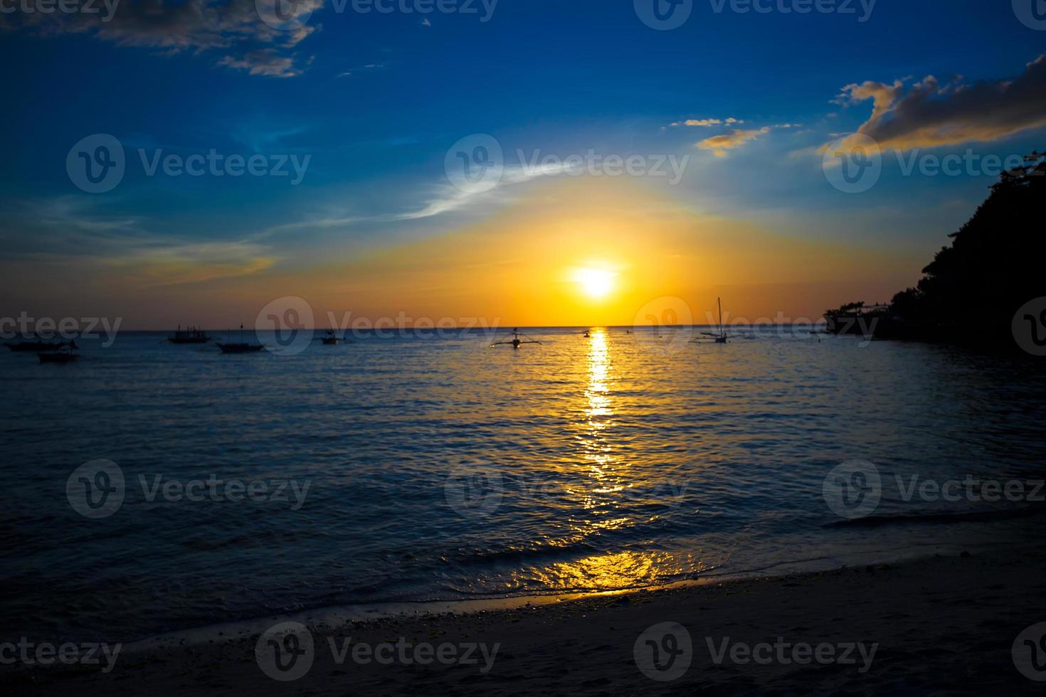 Colorful bright sunset on the island Boracay, Philippines photo