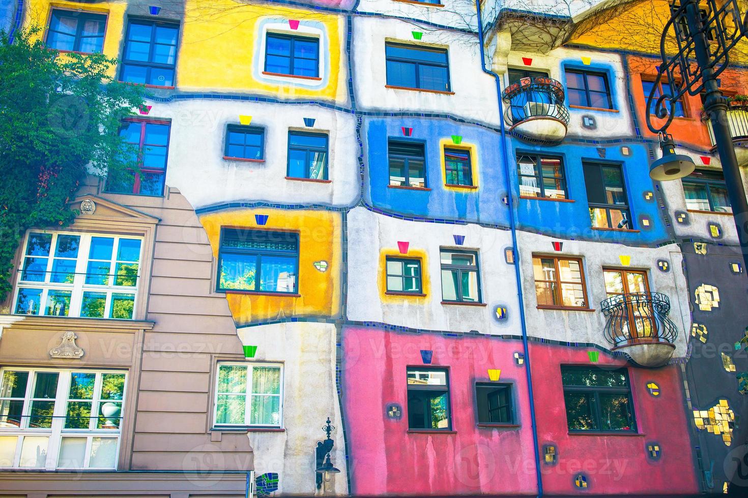 Hundertwasser house with a garden upstairs in Vienna, Austria photo